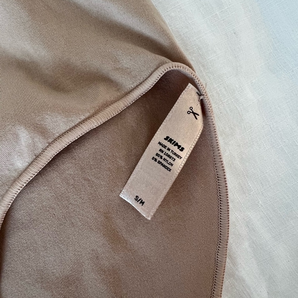 SKIMS Tank Bodysuit in Nude Taupe - Picture 2 of 2